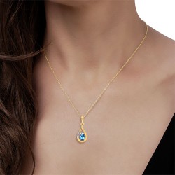 Collier Or 375/1000 Topaze bleue Suisse poire et 4 Diamants porté